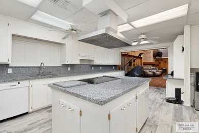 Nestled in the heart of San Benito, this stunning resaca-front - photo 13