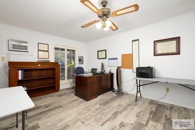 Nestled in the heart of San Benito, this stunning resaca-front - photo 19