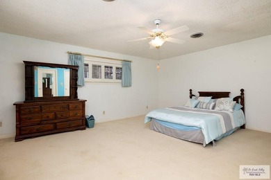 Nestled in the heart of San Benito, this stunning resaca-front - photo 26