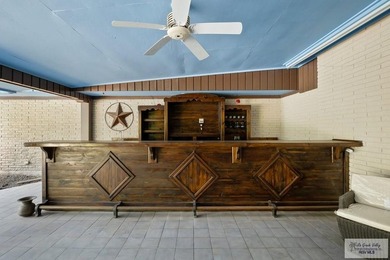 Nestled in the heart of San Benito, this stunning resaca-front - photo 32