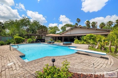 Nestled in the heart of San Benito, this stunning resaca-front - photo 36
