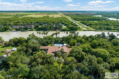 Nestled in the heart of San Benito, this stunning resaca-front - photo 44