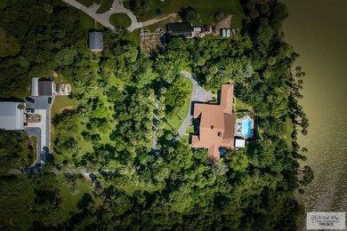 Nestled in the heart of San Benito, this stunning resaca-front - photo 46