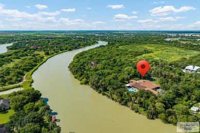 Nestled in the heart of San Benito, this stunning resaca-front - photo 48