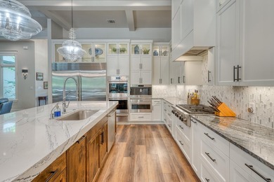 Estate living in the prestigious gated Horseshoe Bay equestrian - photo 11