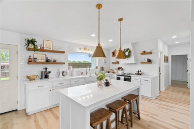 Beautifully renovated and move-in ready! Situated on a spacious - photo 2