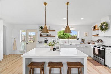 Beautifully renovated and move-in ready! Situated on a spacious - photo 3
