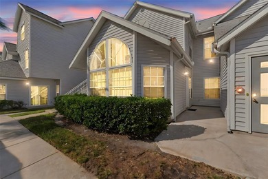 Welcome to this ground-floor, corner-unit condo that offers an - photo 1