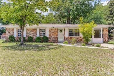 Step into the delightful 3-bedroom, 2-bath haven nestled in the - photo 2