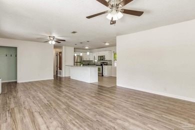 Step into the delightful 3-bedroom, 2-bath haven nestled in the - photo 10
