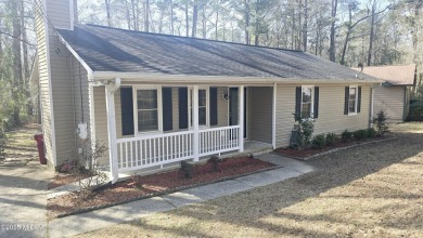 Nestled within the gated community of Lake Wildwood, this - Lake Home For Sale in Macon, Georgia