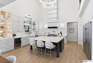 THE ART OF LAKEFRONT LUXURY! Rising majestically from the sands - photo 12