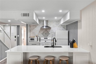 Coastal living meets effortless fun in this beautifully updated - photo 2