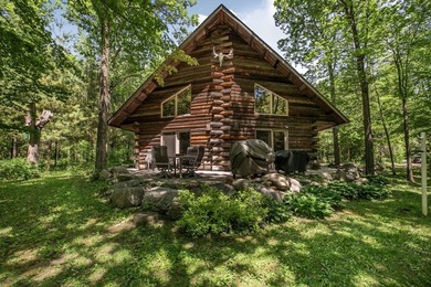 Tucked away on 1.78 private and wooded acres along the majestic - photo 1