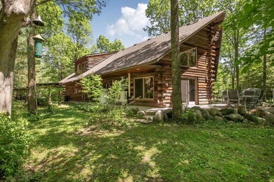 Tucked away on 1.78 private and wooded acres along the majestic - photo 2