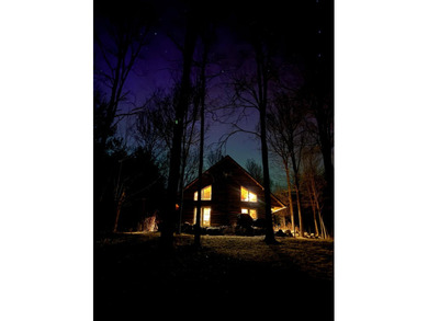 Tucked away on 1.78 private and wooded acres along the majestic - photo 5