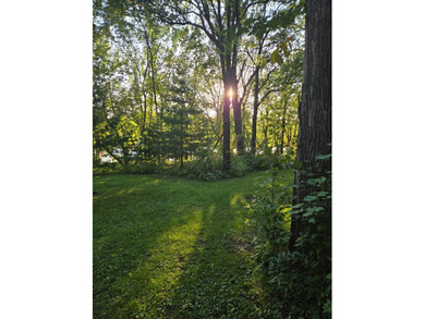 Tucked away on 1.78 private and wooded acres along the majestic - photo 7