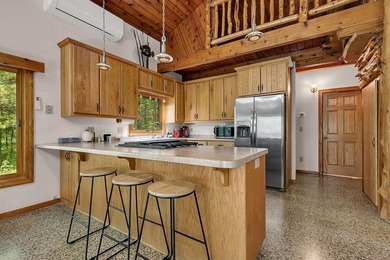 Tucked away on 1.78 private and wooded acres along the majestic - photo 10