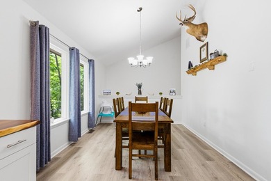 Stunning renovated contemporary with a park like setting perched - photo 9