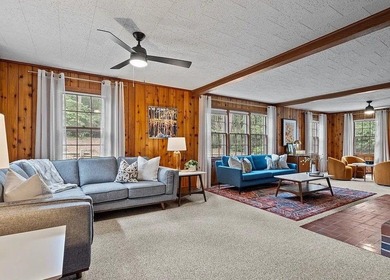 Beautiful Mid-Century Modern Cedar Sided Rach on over 15 acres - photo 11