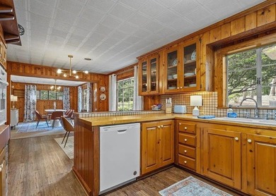 Beautiful Mid-Century Modern Cedar Sided Rach on over 15 acres - photo 12