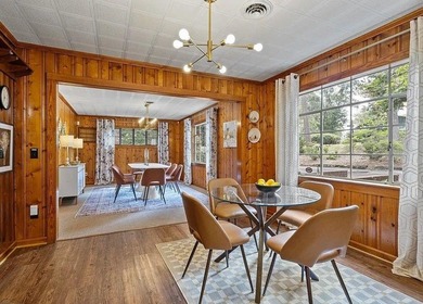 Beautiful Mid-Century Modern Cedar Sided Rach on over 15 acres - photo 14