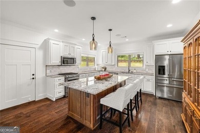 Offered for the first time, this custom-designed home captures - photo 14