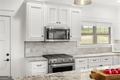 Offered for the first time, this custom-designed home captures - photo 19