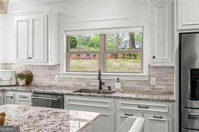Offered for the first time, this custom-designed home captures - photo 21