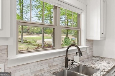 Offered for the first time, this custom-designed home captures - photo 22
