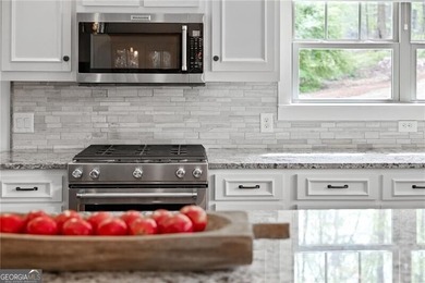 Offered for the first time, this custom-designed home captures - photo 24