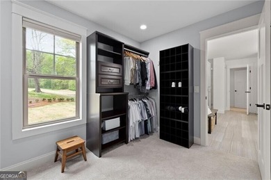 Offered for the first time, this custom-designed home captures - photo 49