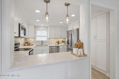 New roof, newer windows! Enjoy resort living in this lovely and - photo 3
