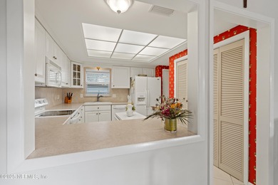 New roof, newer windows! Enjoy resort living in this lovely and - photo 6