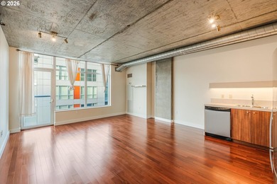 Modern 5th-floor loft condo next to Providence Park, home of the
