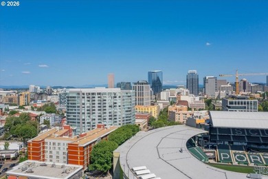 Modern 5th-floor loft condo next to Providence Park, home of the