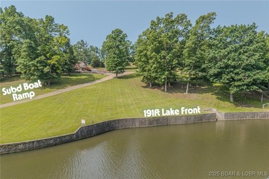 ABSOLUTELY GEORGOUS lake front building lot that is just over - photo 6