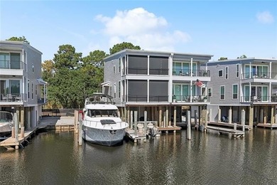 Luxury living on the beautiful Tchefuncte River! 
This stunning