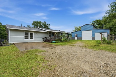 Located inside the city limits on Lake Tawakoni, this waterfront - photo 3