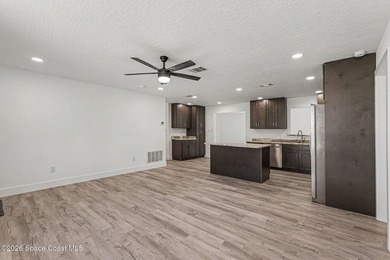 Completely updated 3-bedroom, 2-bath home with city water in the - photo 6