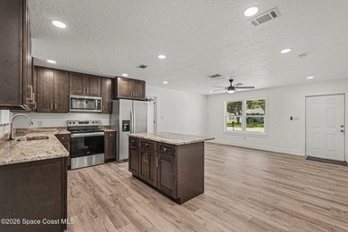 Completely updated 3-bedroom, 2-bath home with city water in the - photo 7