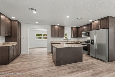 Completely updated 3-bedroom, 2-bath home with city water in the - photo 8