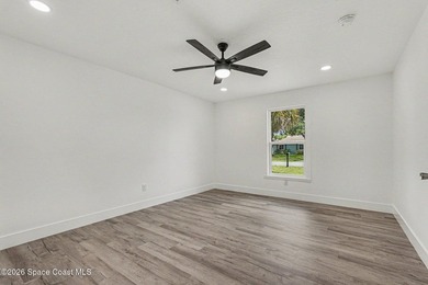 Completely updated 3-bedroom, 2-bath home with city water in the - photo 10