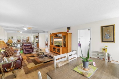 Enjoy spectacular lake and golf course views from this spacious