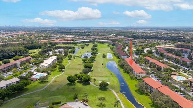 Enjoy spectacular lake and golf course views from this spacious