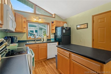 Looking for a 2-bedroom home in Lake Ozark sitting directly on - photo 18