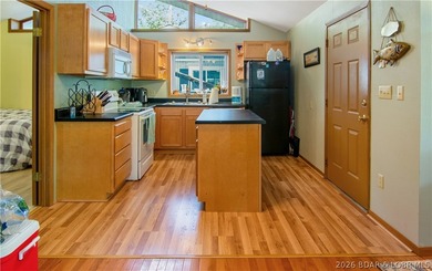 Looking for a 2-bedroom home in Lake Ozark sitting directly on - photo 19