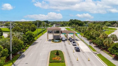 Enjoy spectacular lake and golf course views from this spacious