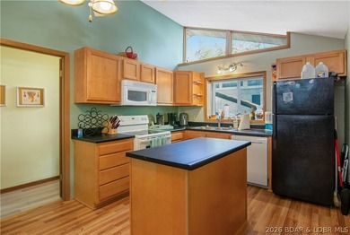 Looking for a 2-bedroom home in Lake Ozark sitting directly on - photo 21