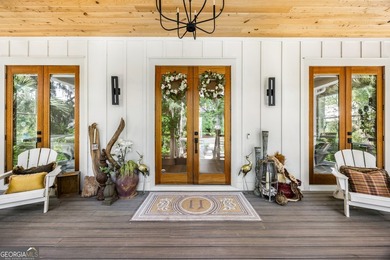 Welcome to an extraordinary waterfront retreat offering the - photo 7